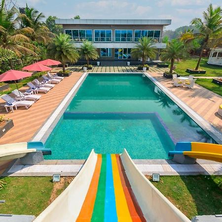 Saffronstays Palm Paradise: Poolside Oasis with Slides and Games Padghe Exterior photo
